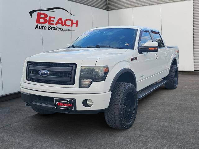 used 2014 Ford F-150 car, priced at $21,000