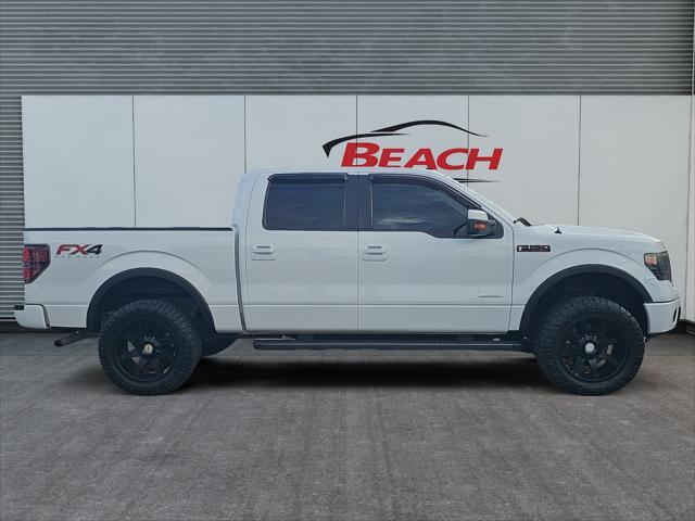 used 2014 Ford F-150 car, priced at $21,000