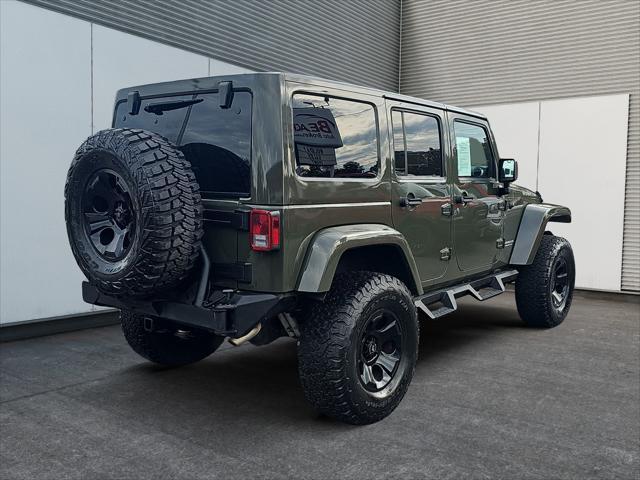 used 2015 Jeep Wrangler Unlimited car, priced at $23,411