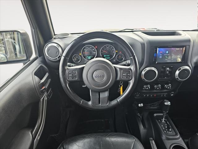 used 2015 Jeep Wrangler Unlimited car, priced at $23,411