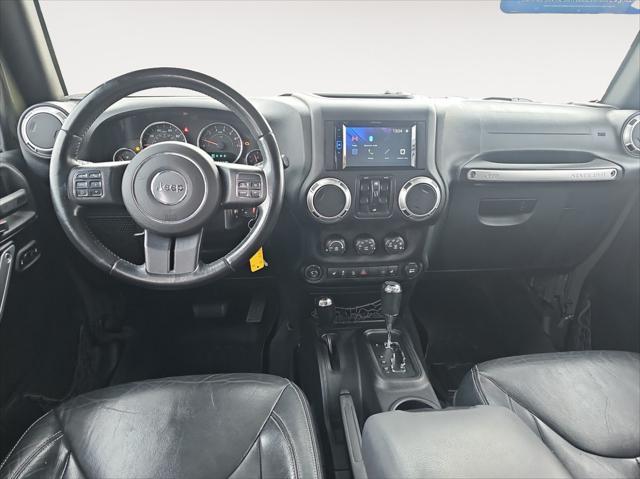 used 2015 Jeep Wrangler Unlimited car, priced at $23,411