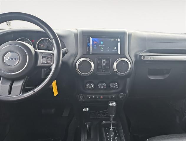 used 2015 Jeep Wrangler Unlimited car, priced at $23,411