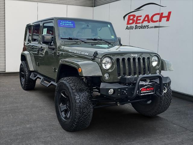 used 2015 Jeep Wrangler Unlimited car, priced at $23,411