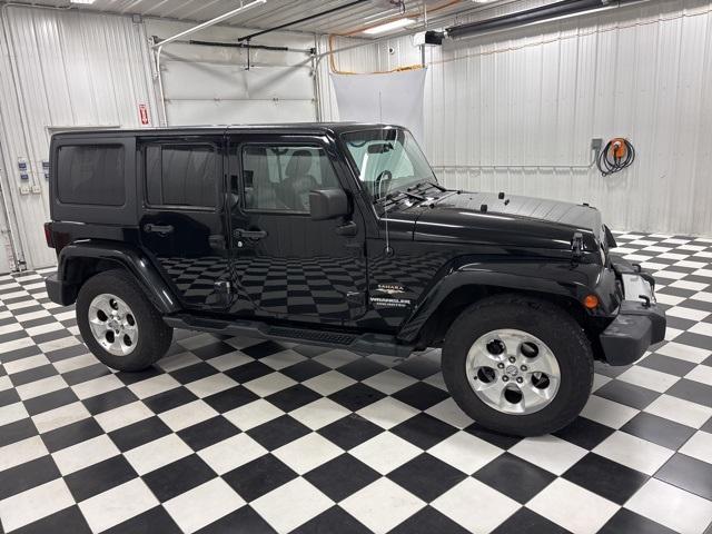used 2012 Jeep Wrangler Unlimited car, priced at $10,899