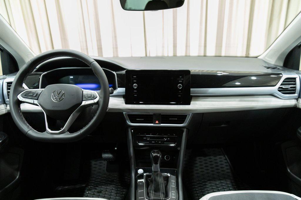 new 2025 Volkswagen Taos car, priced at $30,696