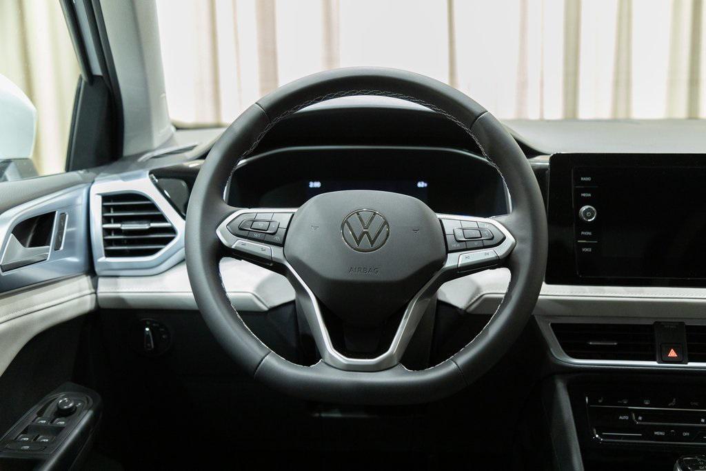 new 2025 Volkswagen Taos car, priced at $30,696