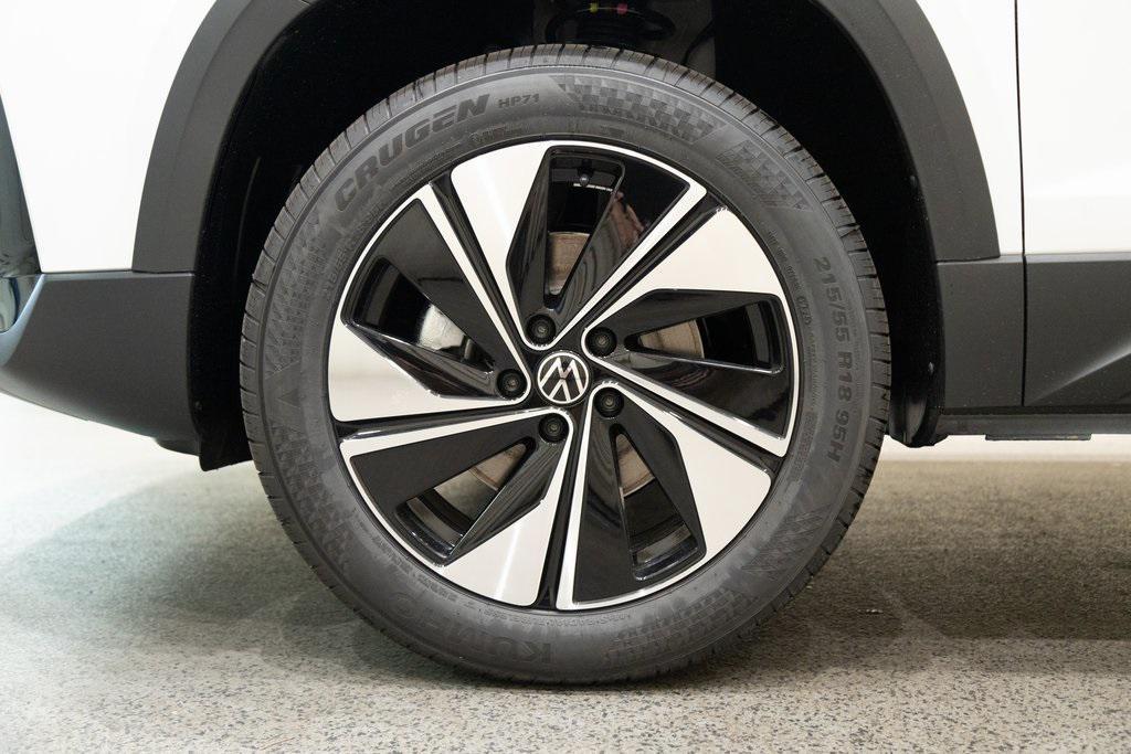 new 2025 Volkswagen Taos car, priced at $30,696