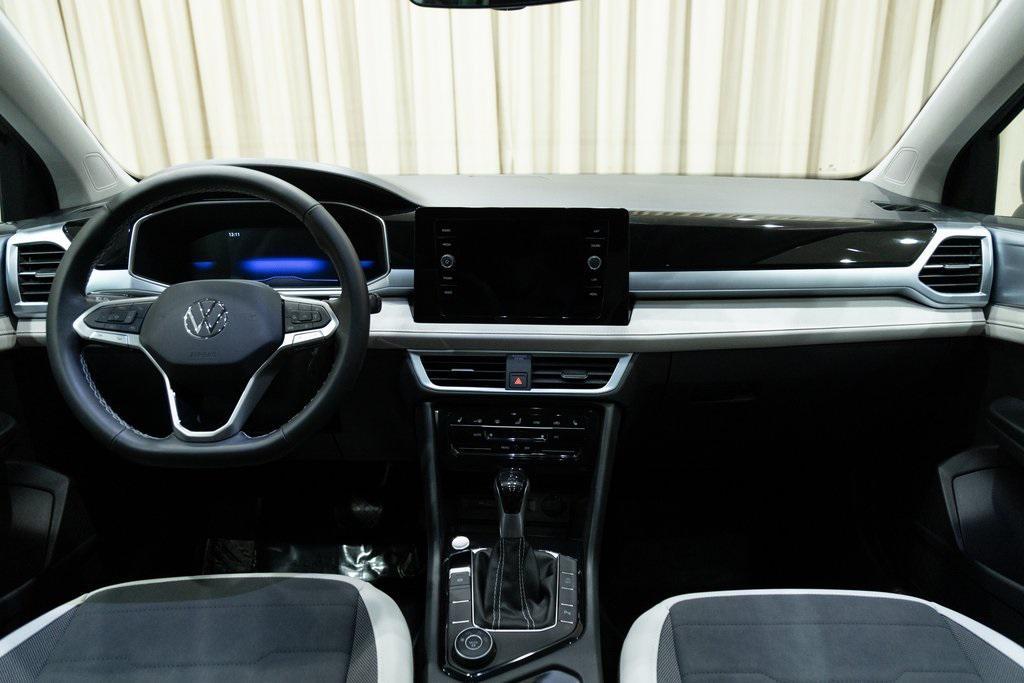 used 2025 Volkswagen Taos car, priced at $25,940