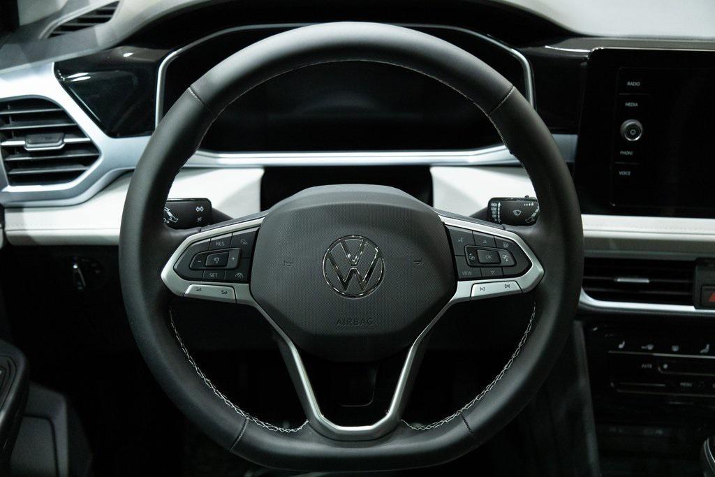 used 2025 Volkswagen Taos car, priced at $25,940