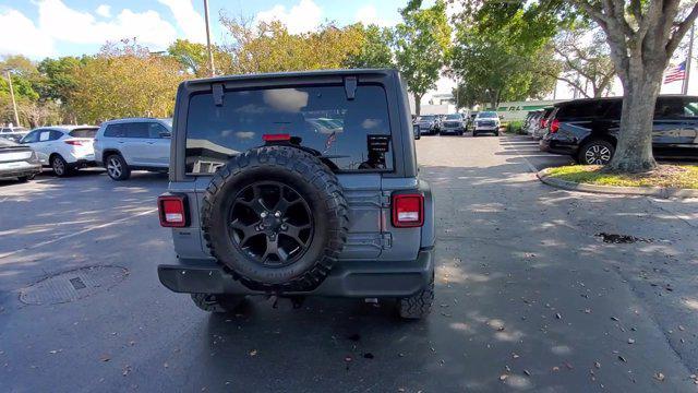 used 2022 Jeep Wrangler Unlimited car, priced at $27,218