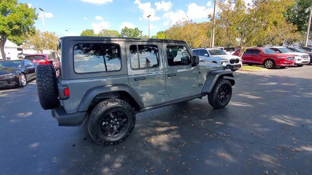 used 2022 Jeep Wrangler Unlimited car, priced at $27,218