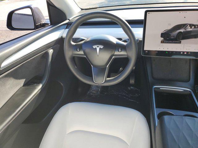 used 2023 Tesla Model Y car, priced at $33,374