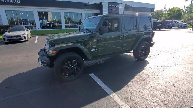 used 2024 Jeep Wrangler 4xe car, priced at $32,179