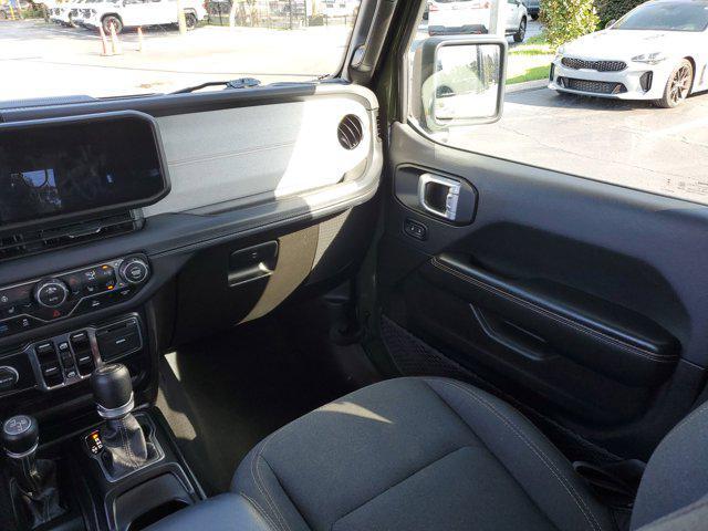 used 2024 Jeep Wrangler 4xe car, priced at $32,179