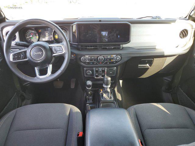 used 2024 Jeep Wrangler 4xe car, priced at $32,179