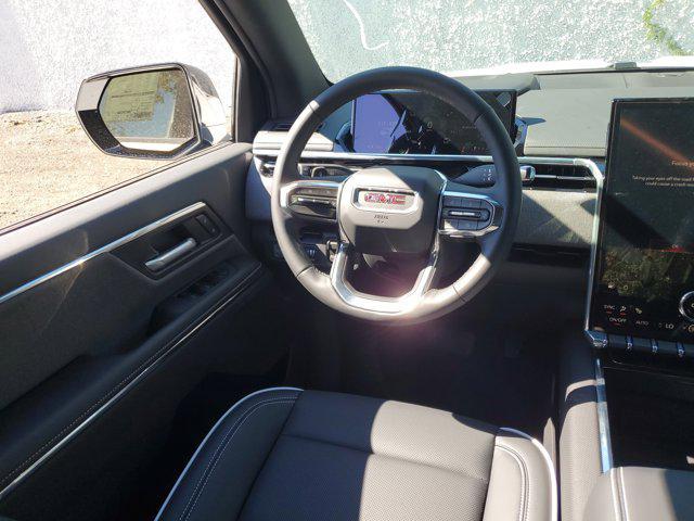 new 2026 GMC Sierra EV car, priced at $60,938