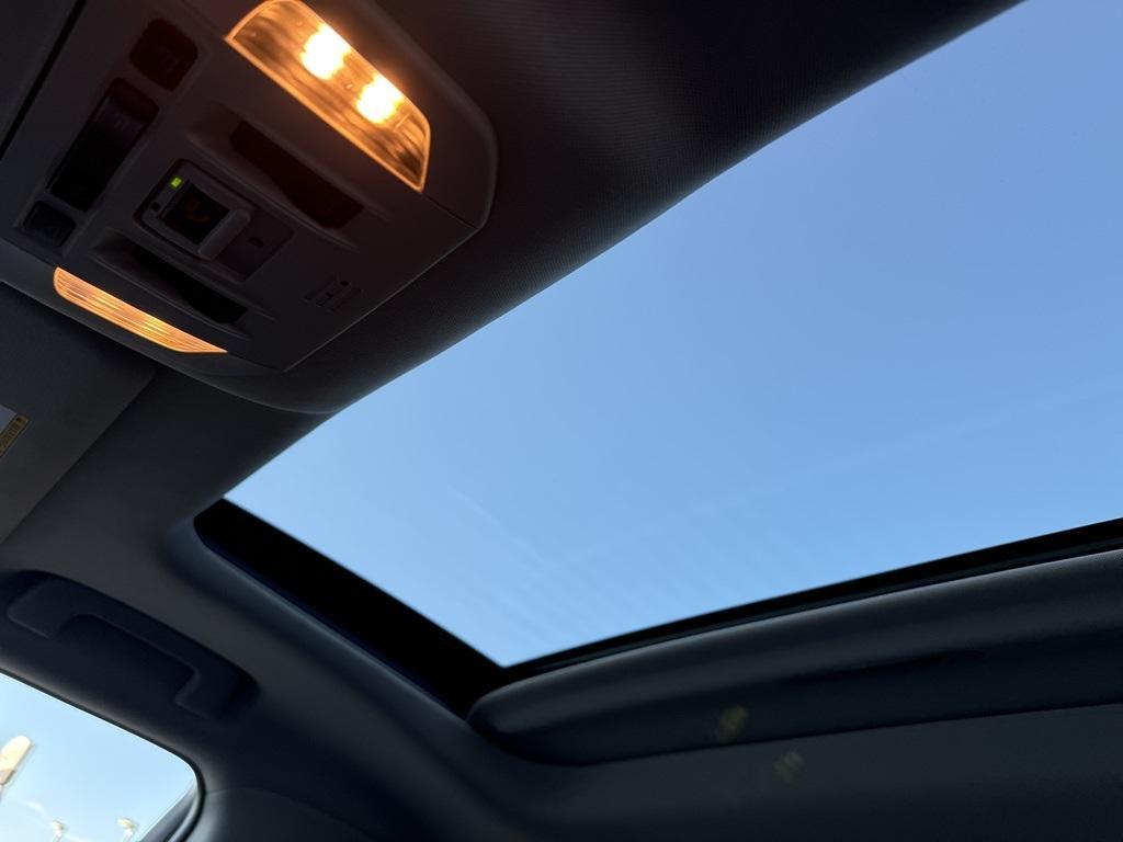 used 2021 Toyota Highlander Hybrid car, priced at $29,285