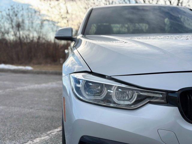 used 2018 BMW 330 car, priced at $17,980