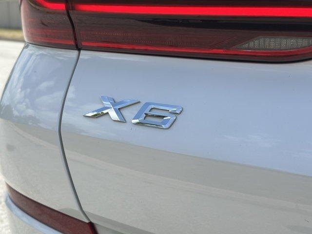 used 2023 BMW X6 car, priced at $57,889