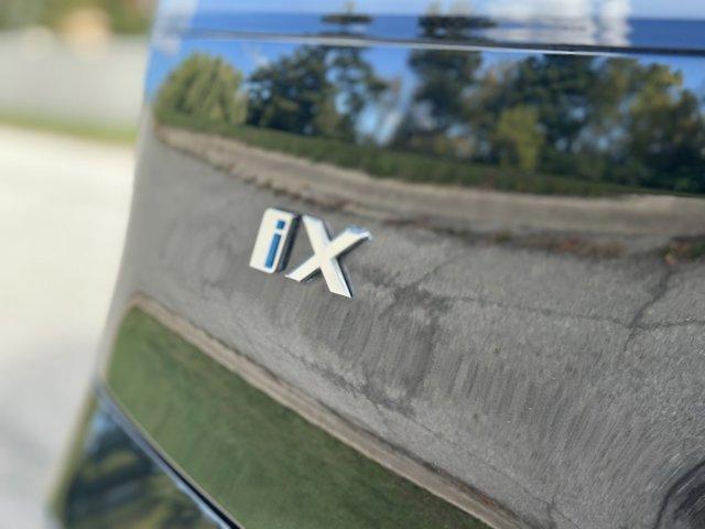 used 2024 BMW iX car, priced at $53,980