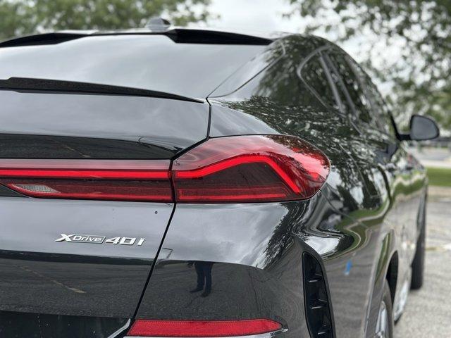 used 2025 BMW X6 car, priced at $73,980