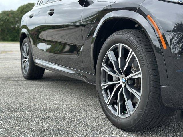 used 2025 BMW X6 car, priced at $73,980