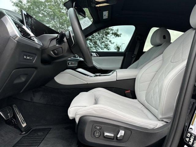 used 2025 BMW X6 car, priced at $73,980