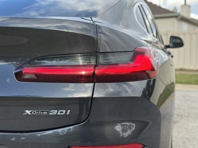 used 2023 BMW X4 car, priced at $40,980