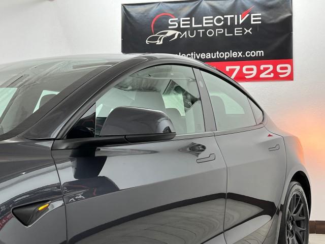 used 2024 Tesla Model 3 car, priced at $34,996