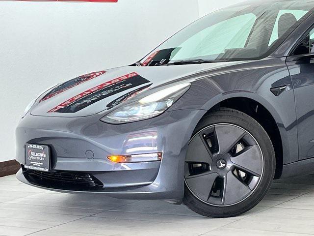 used 2023 Tesla Model 3 car, priced at $21,996