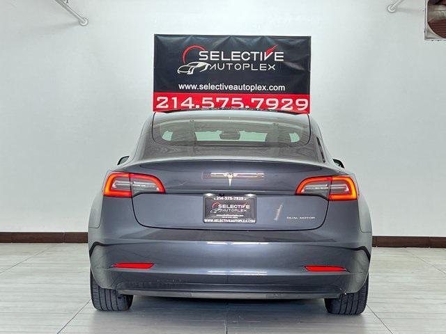 used 2023 Tesla Model 3 car, priced at $21,996