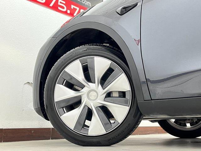 used 2024 Tesla Model Y car, priced at $29,996