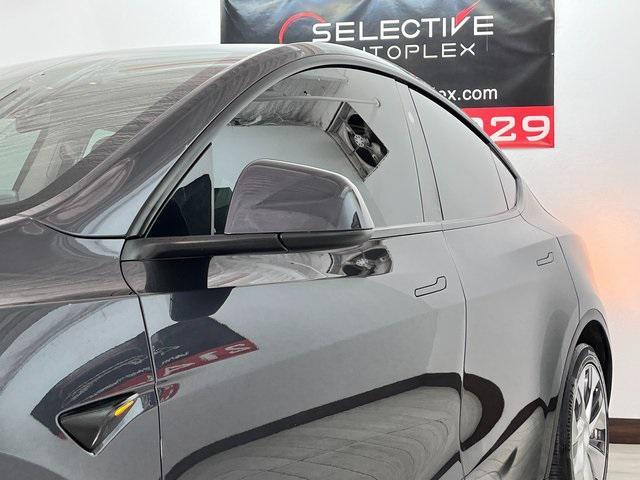 used 2024 Tesla Model Y car, priced at $29,996