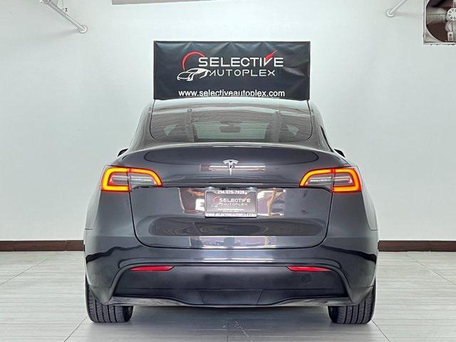 used 2024 Tesla Model Y car, priced at $29,996