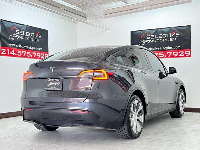 used 2024 Tesla Model Y car, priced at $29,996