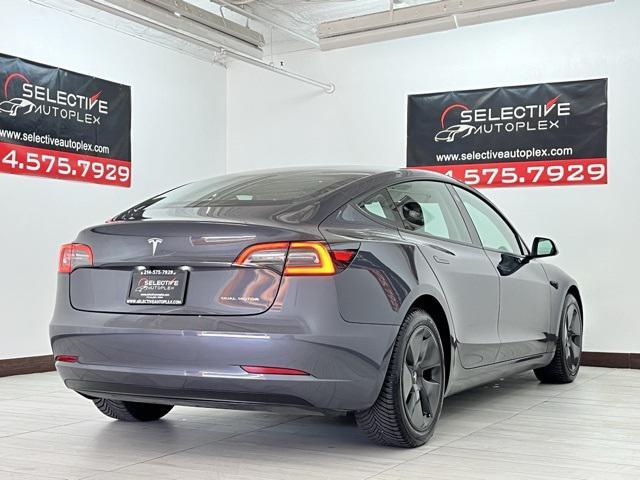 used 2023 Tesla Model 3 car, priced at $25,896