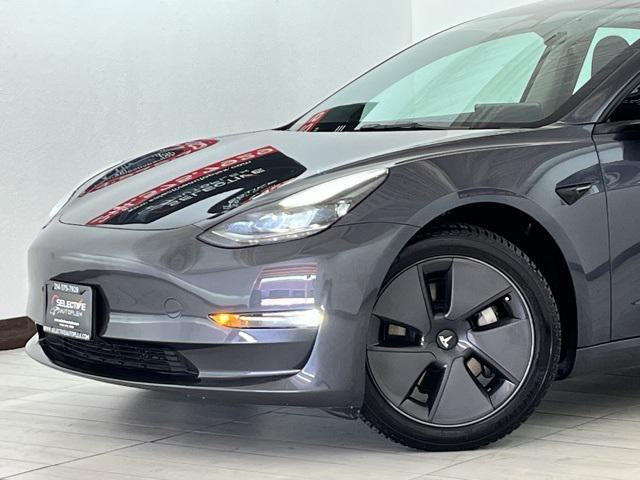 used 2023 Tesla Model 3 car, priced at $25,896