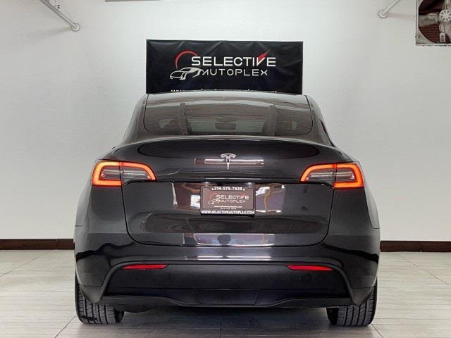 used 2024 Tesla Model Y car, priced at $31,996