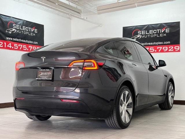 used 2024 Tesla Model Y car, priced at $31,996