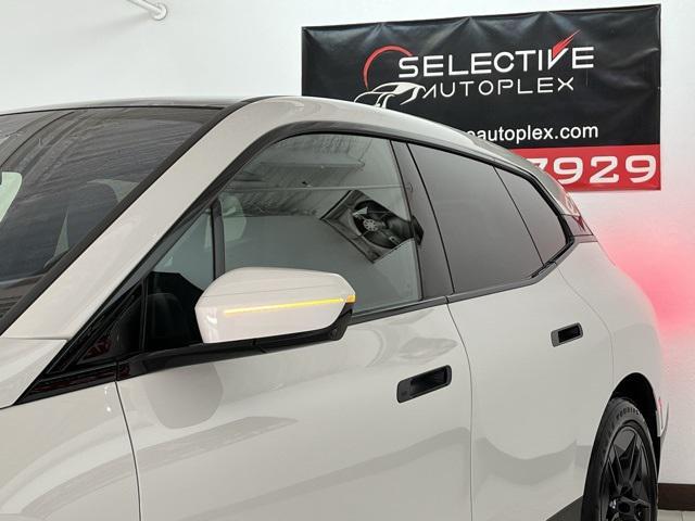 used 2025 BMW iX car, priced at $58,996