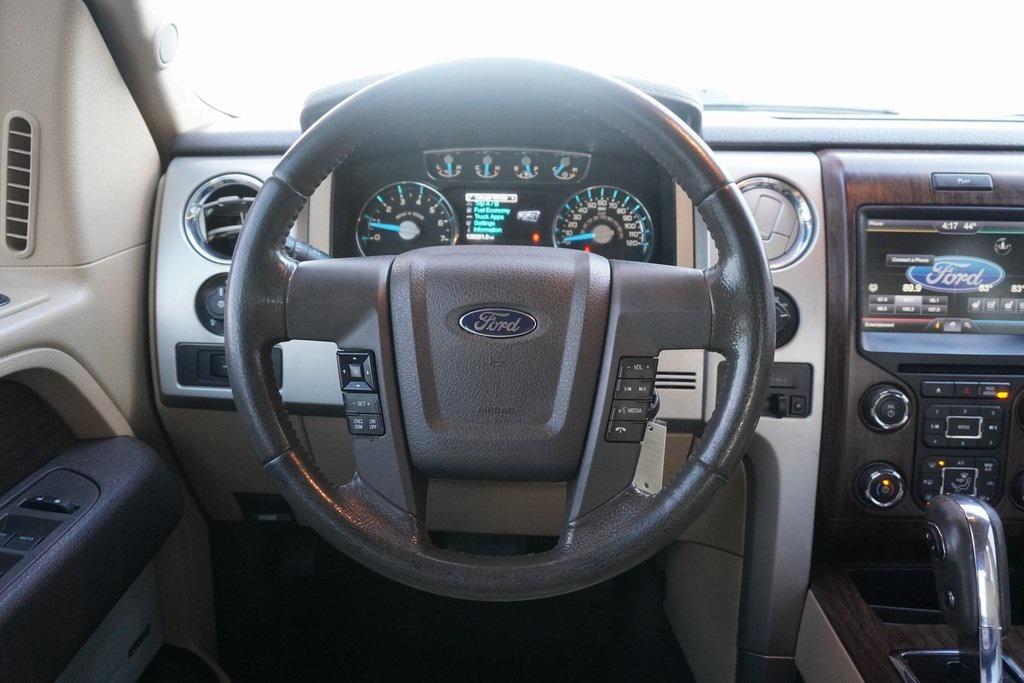 used 2014 Ford F-150 car, priced at $14,000