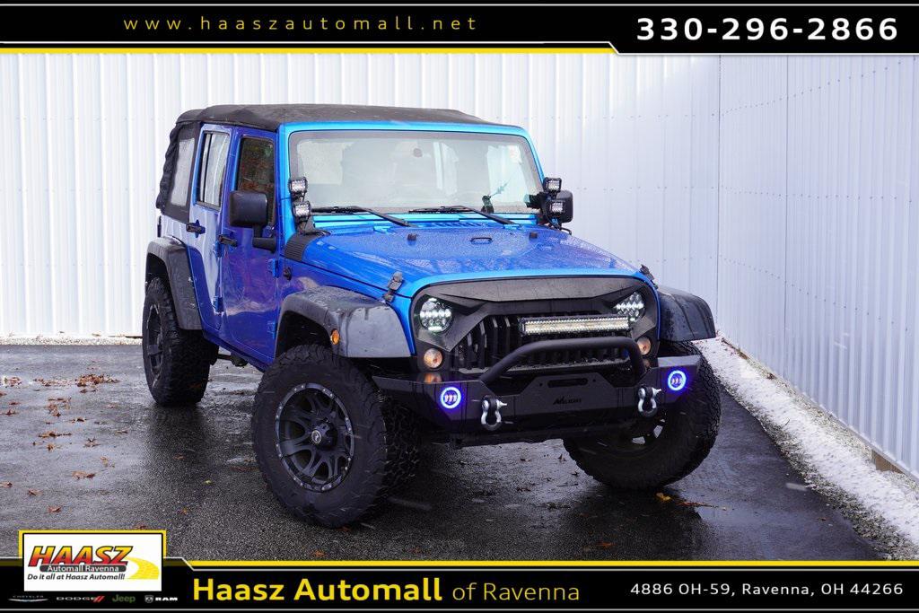 used 2015 Jeep Wrangler Unlimited car, priced at $15,700
