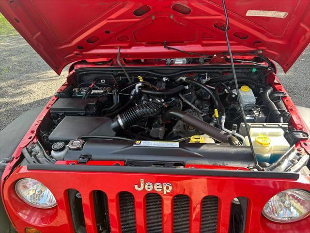 used 2010 Jeep Wrangler Unlimited car, priced at $8,995