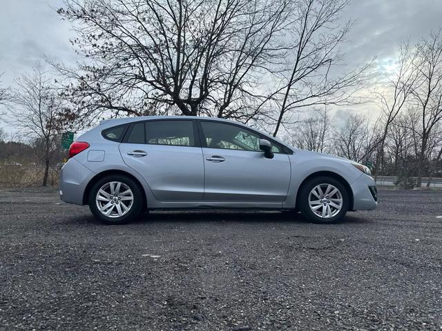 used 2015 Subaru Impreza car, priced at $9,000