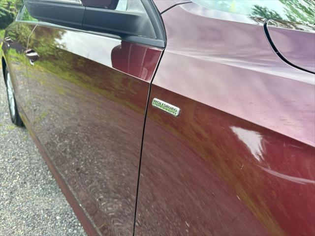 used 2014 Volkswagen Passat car, priced at $6,995