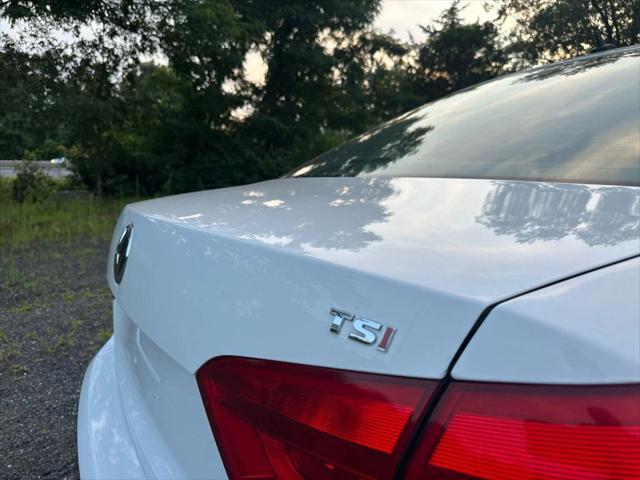 used 2014 Volkswagen Passat car, priced at $5,495