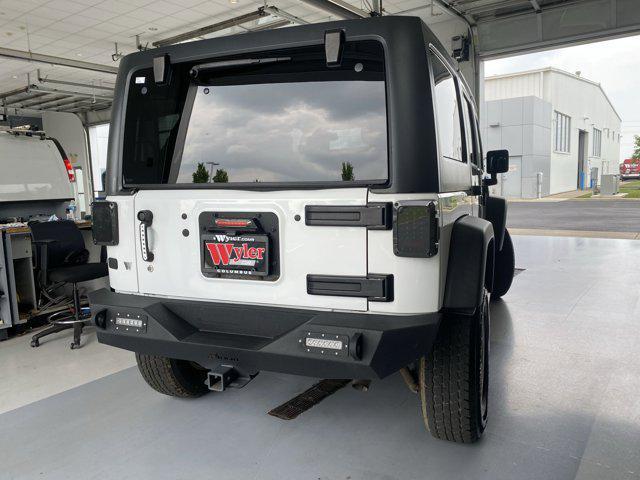 used 2016 Jeep Wrangler Unlimited car, priced at $21,652
