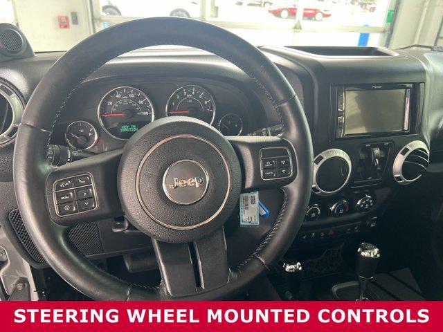 used 2014 Jeep Wrangler Unlimited car, priced at $19,879