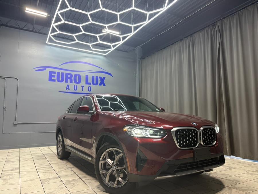 used 2022 BMW X4 car, priced at $34,995