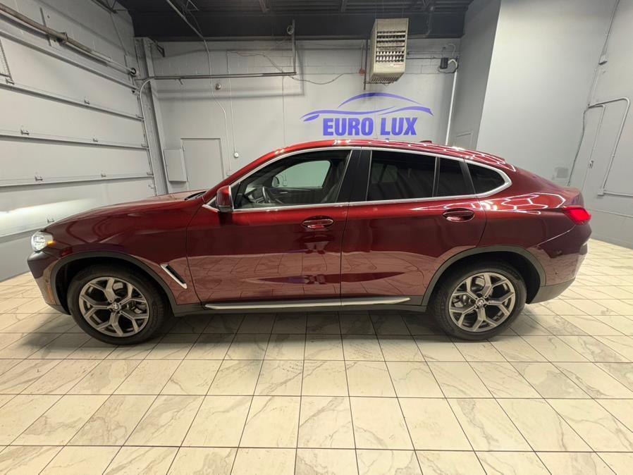used 2022 BMW X4 car, priced at $34,995